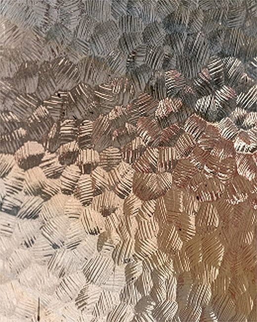 Textured glass with abstract patterns and colors.
