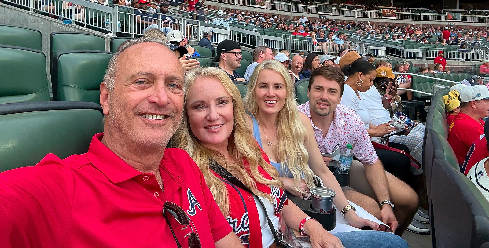 Group enjoying a baseball game together.