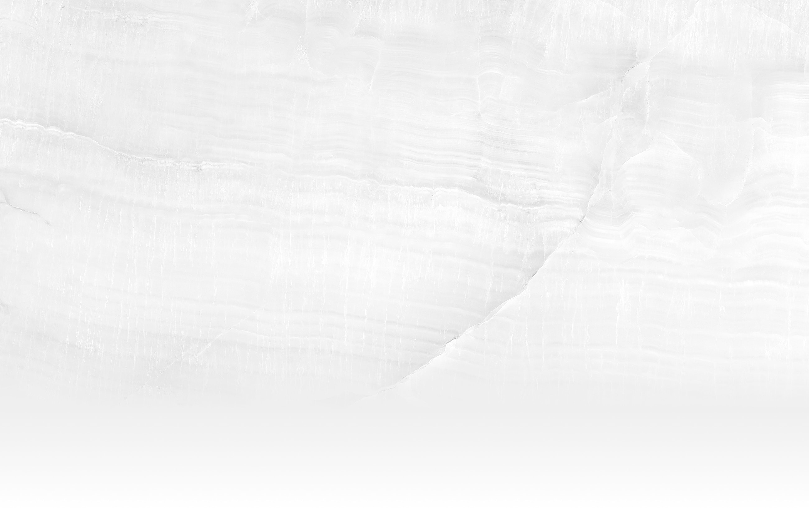 White marble texture with soft, subtle veins.