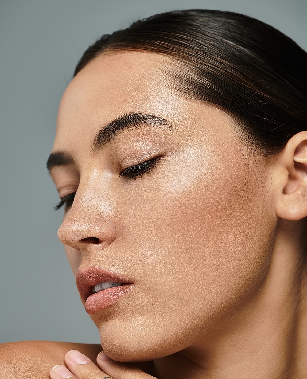Close-up of a woman’s face and profile.