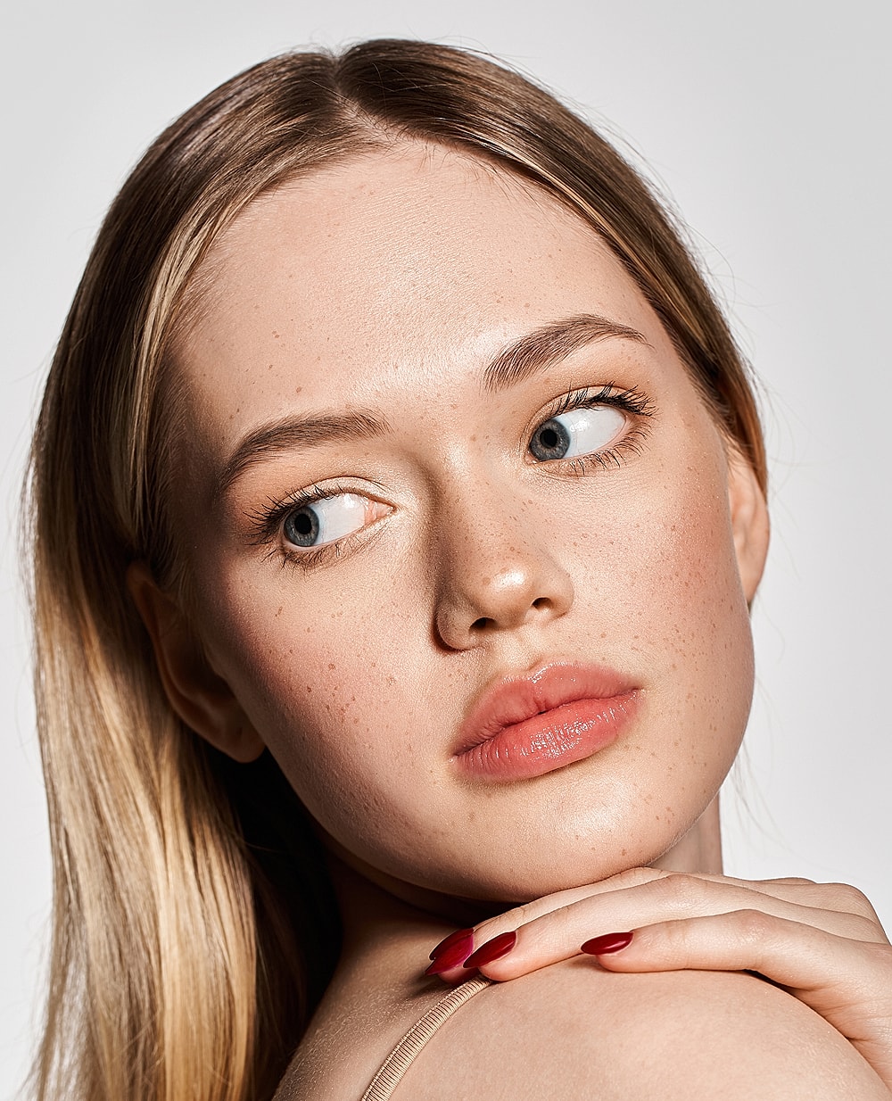 Close-up portrait of a woman with natural beauty.
