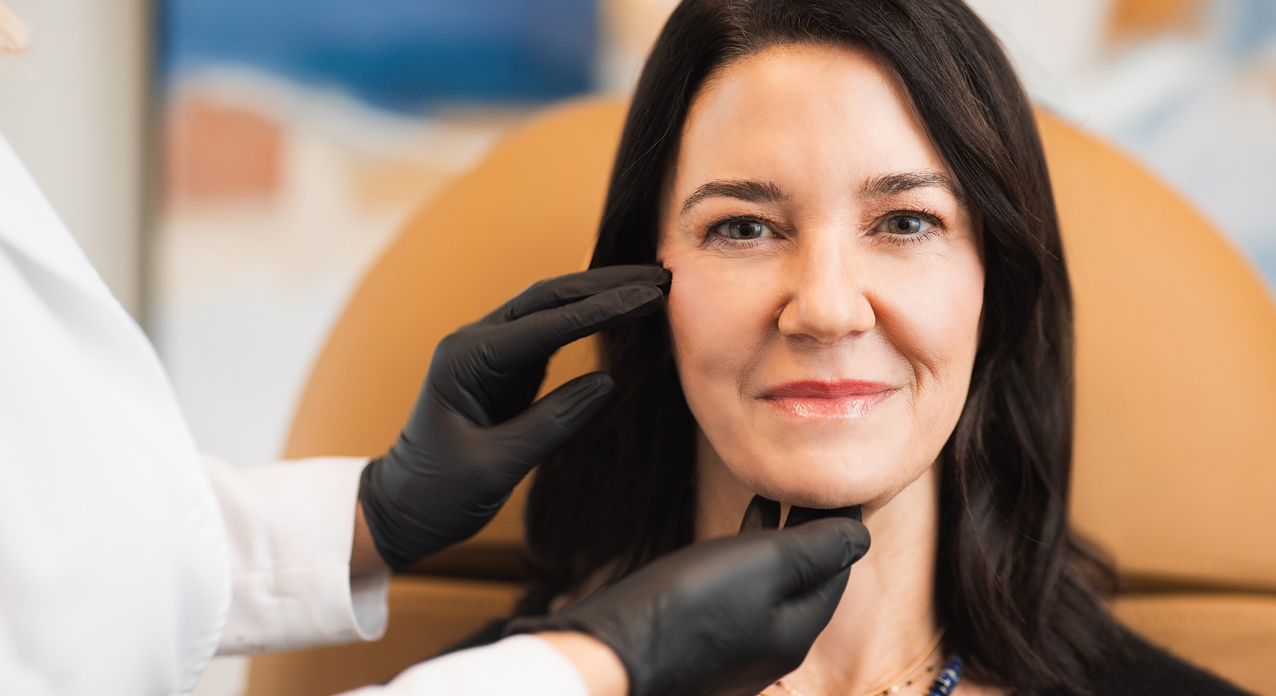 Patient receiving aesthetic treatment in clinic setting.
