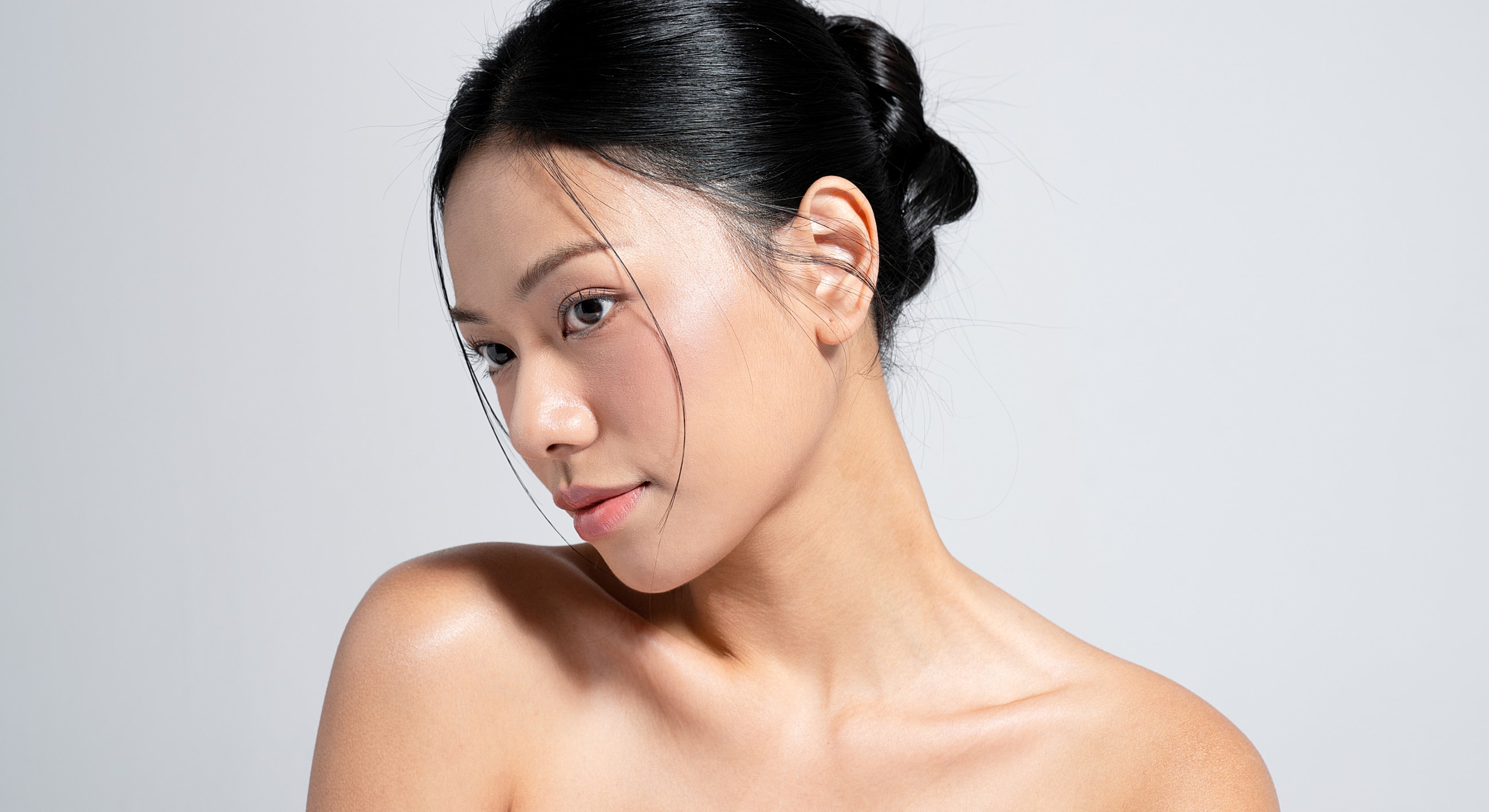 Portrait of a woman with a graceful expression.